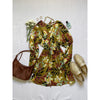 flat lay of tropical print dress