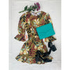 flat lay of tropical print dress and turquoise purse