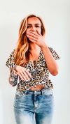 model wearing leopard print top