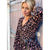plunge neck balloon sleeve dress in leopard print
